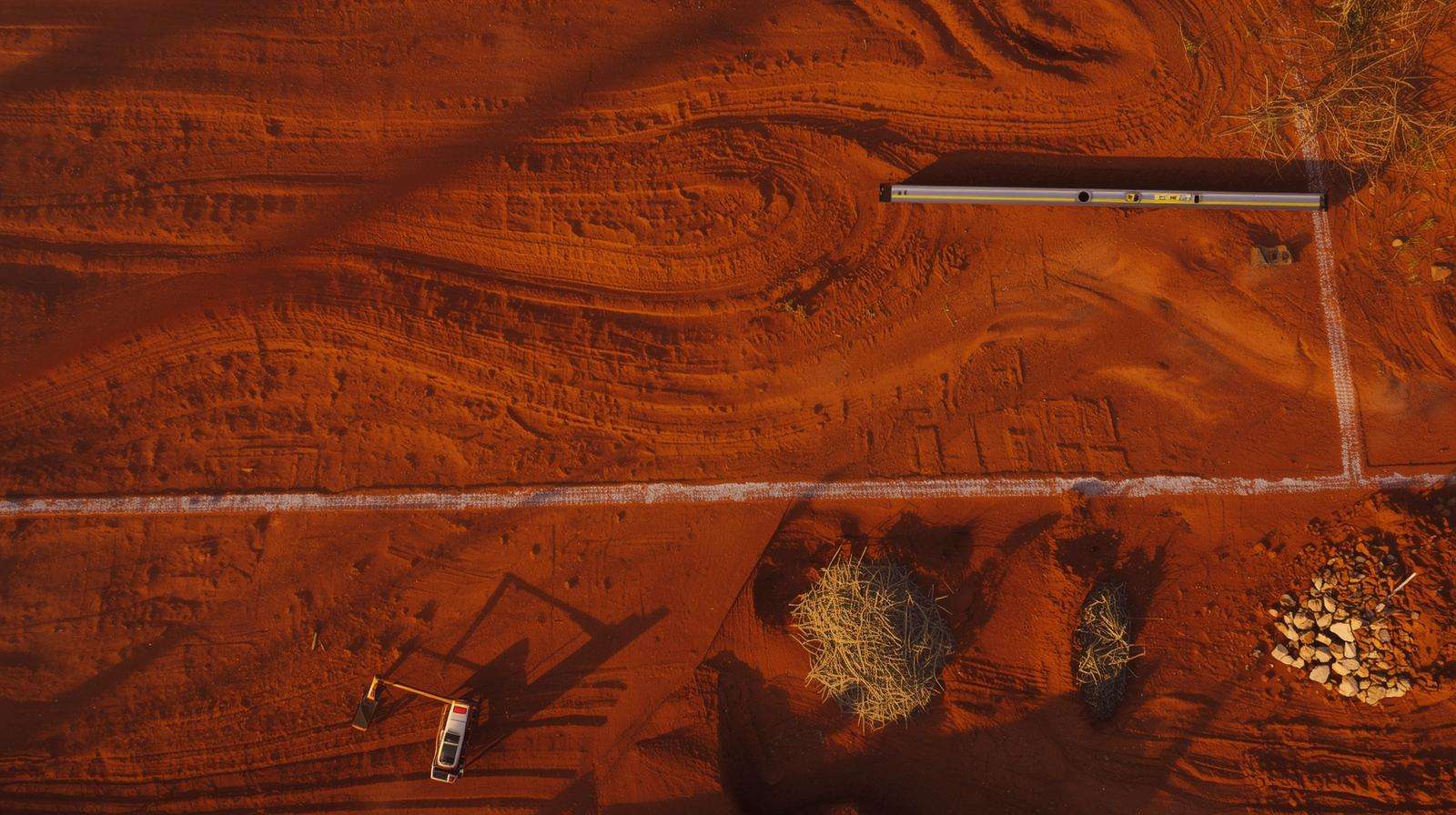 Perfect on-contour layout for Greg Swales using A-frame and laser level before earthworks.